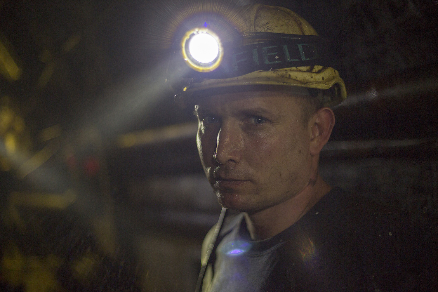 How can workers be protected from natural radiation?