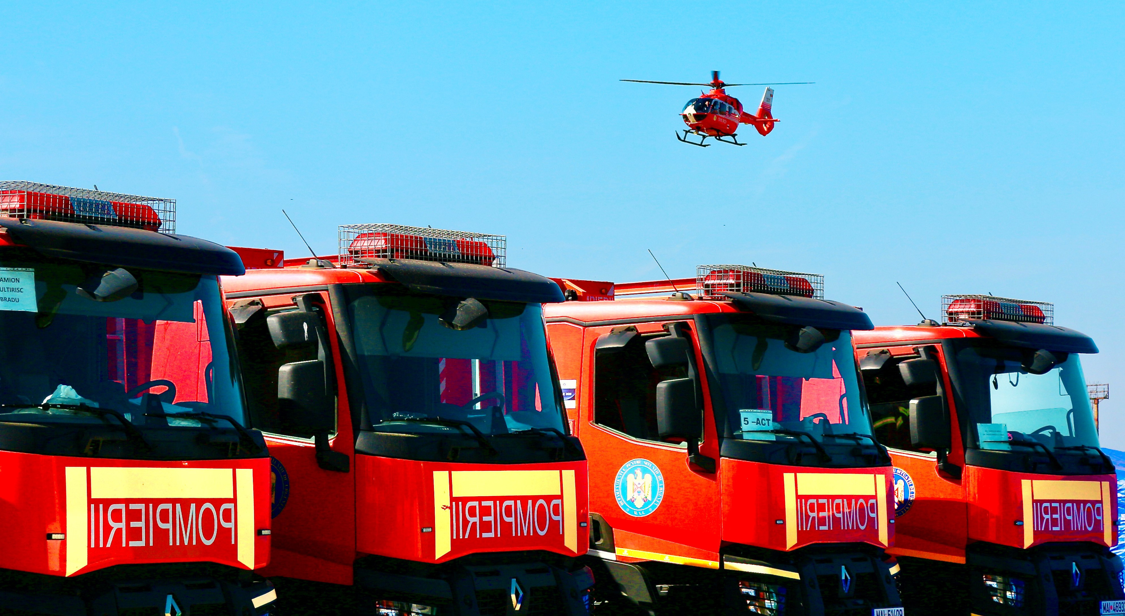 A row of emergency response fire trucks stand ready for action as part of the national preparedness exercise “Valahia” in Romania in October 2023. valahia3.jpg